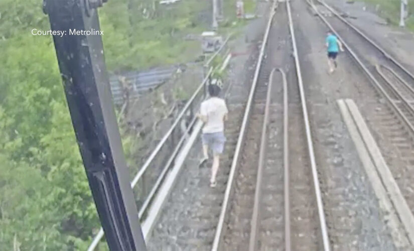 Two Young People Trespassing a Rail Bridge in Toronto Come Within Seconds Of Serious Injury