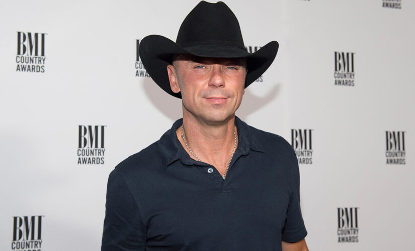 Kenny Chesney continues show as his bleeding finger gets bandaged