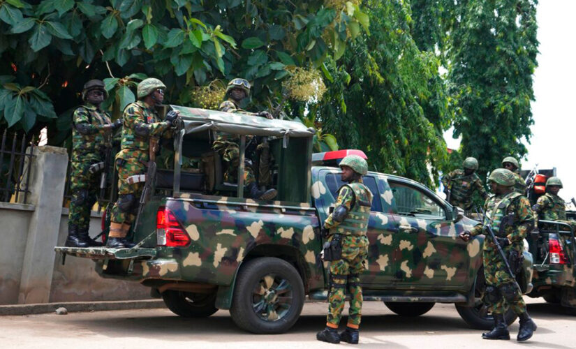 Nigerian church shooting: authorities hunt for gunmen in attack that killed at least 50, including children