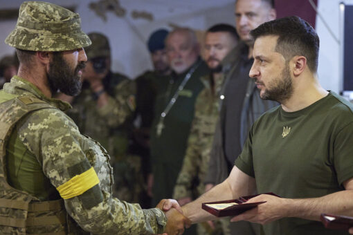Ukraine’s Zelenskyy visits front lines in south as Russian forces pound strategically important city in east