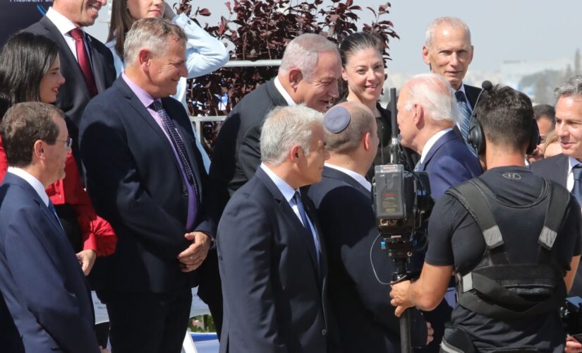 Biden shakes hands with former Israeli PM,  begins ‘no handshake’ policy just before Saudi meeting