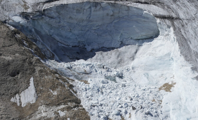 Italy rescuers finding body parts, gear on glacier after avalanche