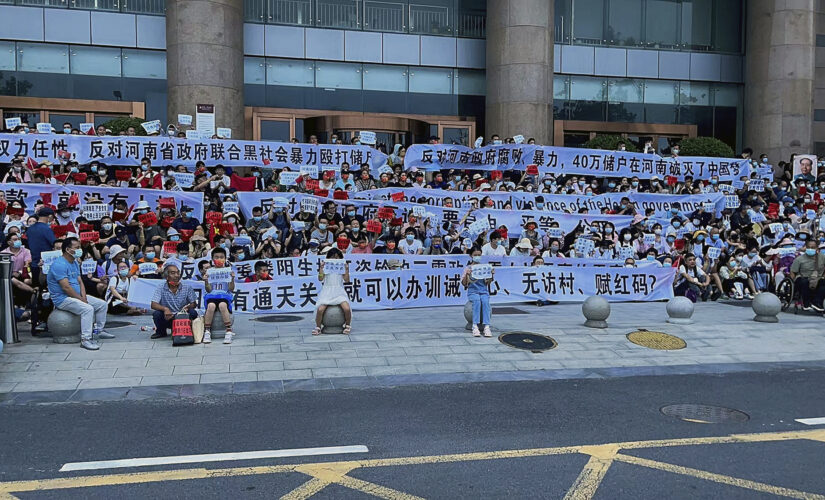 Chinese bank depositors face police in angry protest