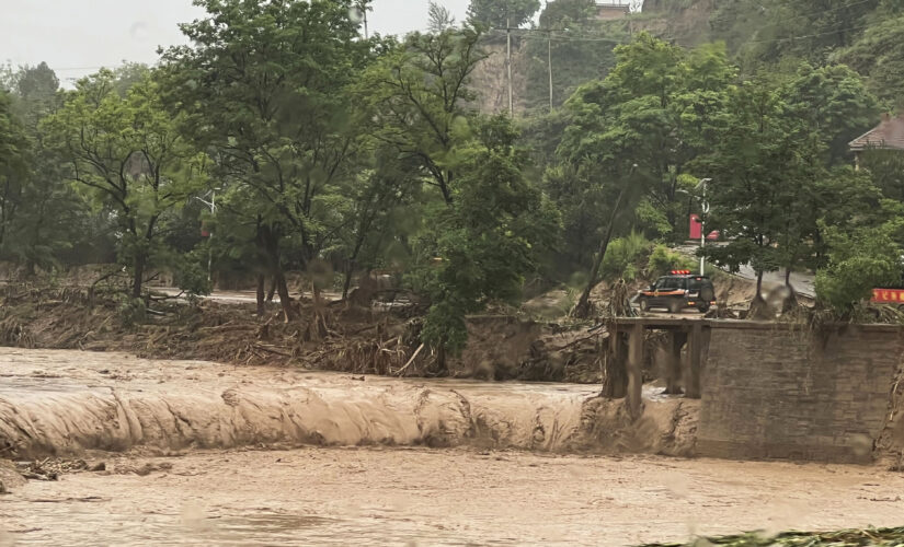 China floods leave at least 12 dead, thousands evacuated