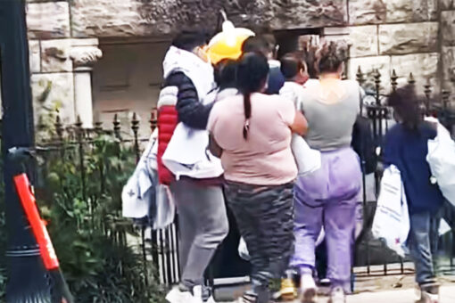 Video appears to show migrants led from bus to DC church, located steps away from U.S. Capitol