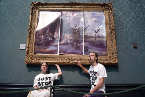 UK climate protesters glue themselves to Constable frame