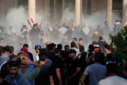 Baghdad, Iraq violence leaves at least 30 dead, cleric tells protesters to withdraw