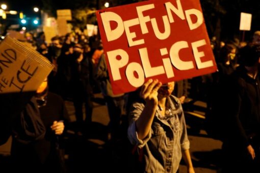 New executive director of liberal dark money education group has repeatedly called to defund the police
