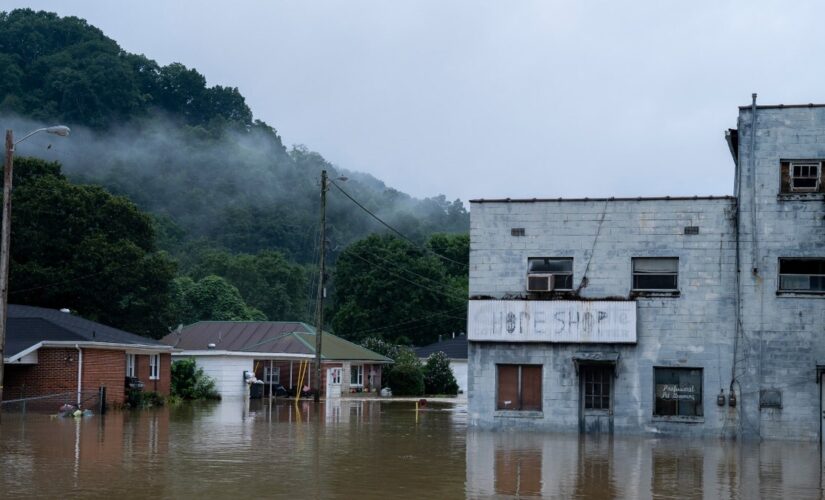 White House targets climate change as Joe Biden lands in Kentucky to survey flood damage