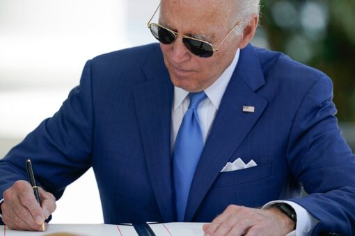 Biden pushes back signing burn pits bill after Republicans took heat for delay