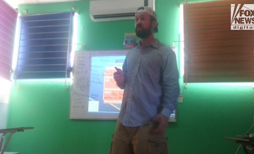 RJ McLeod caught: Most Wanted fugitive captured in El Salvador pictured teaching English class at local school