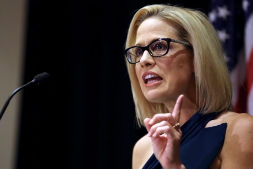Sinema still undecided on Manchin social spending bill, will make determination after parliamentarian review