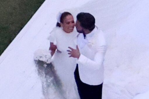 Ben Affleck and Jennifer Lopez seal it with a kiss as photos from their wedding day reveal gorgeous ceremony