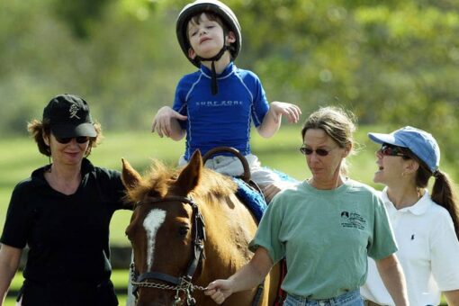 Equine therapy helping children with cerebral palsy from low-income families in Caracas