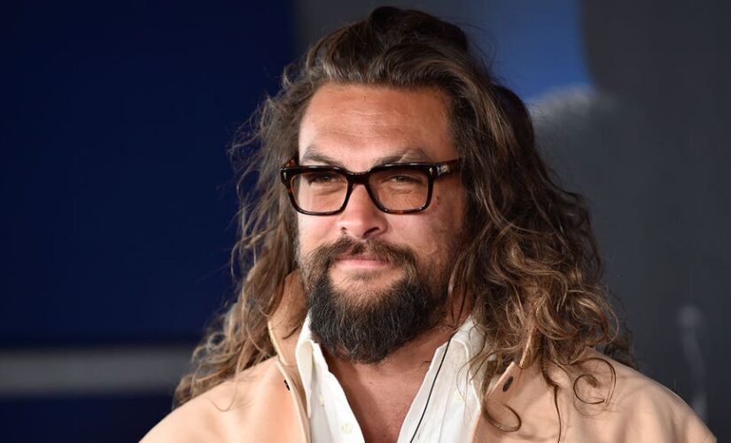 Jason Momoa surprises airline passengers by handing out water, gets called ‘Aguaman’