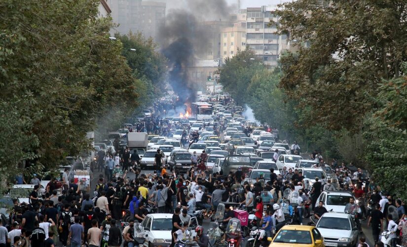 Iran protests: 9 dead in escalating unrest as demonstrators set fire to police stations, stab regime enforcer