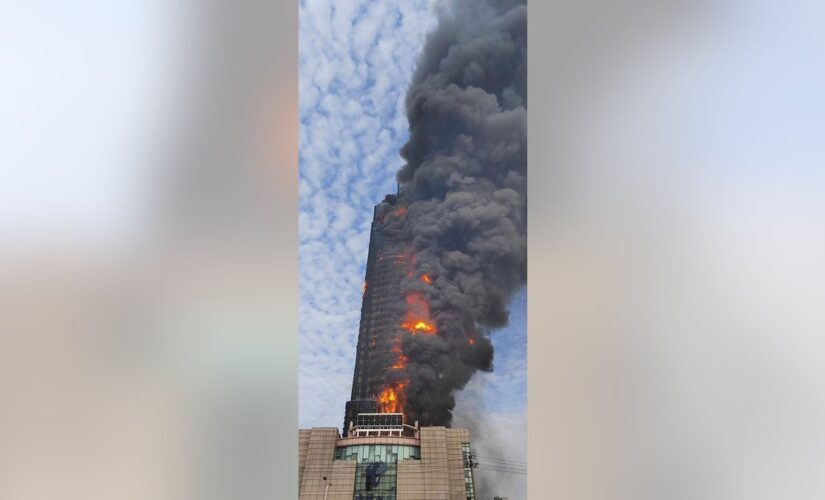 42-floor Chinese skyscraper engulfed in flames