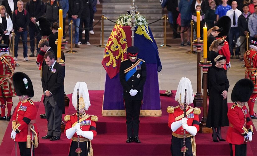 Queen Elizabeth II’s grandchildren, including Princes Harry and William, hold vigil at coffin