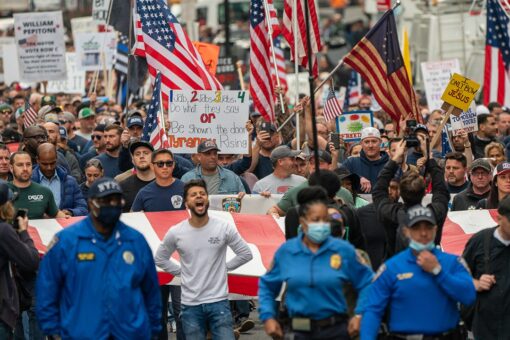 Unvaccinated Americans face job loss, no pay while seeking exemptions from state and local COVID mandates
