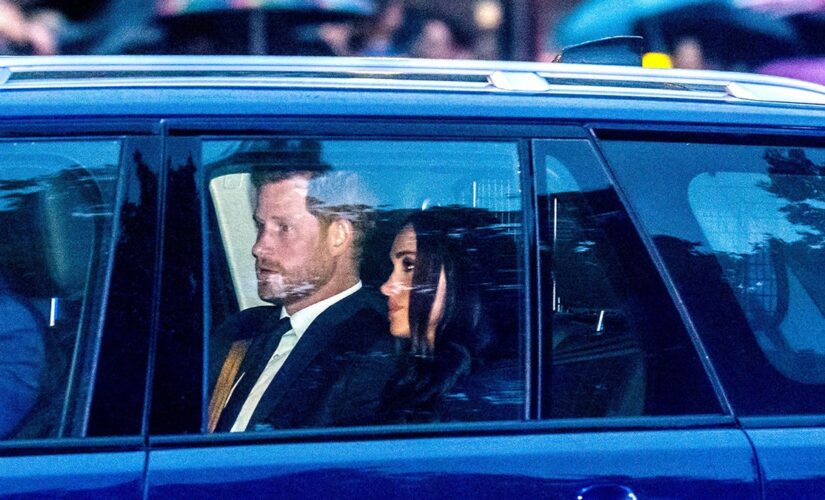 Prince Harry and Meghan Markle join royal family at Buckingham Palace to receive Queen Elizabeth II’s coffin