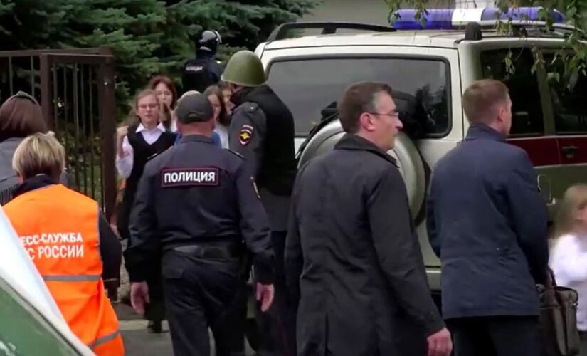 Swastika-wearing gunman kills 15 in Russian school shooting