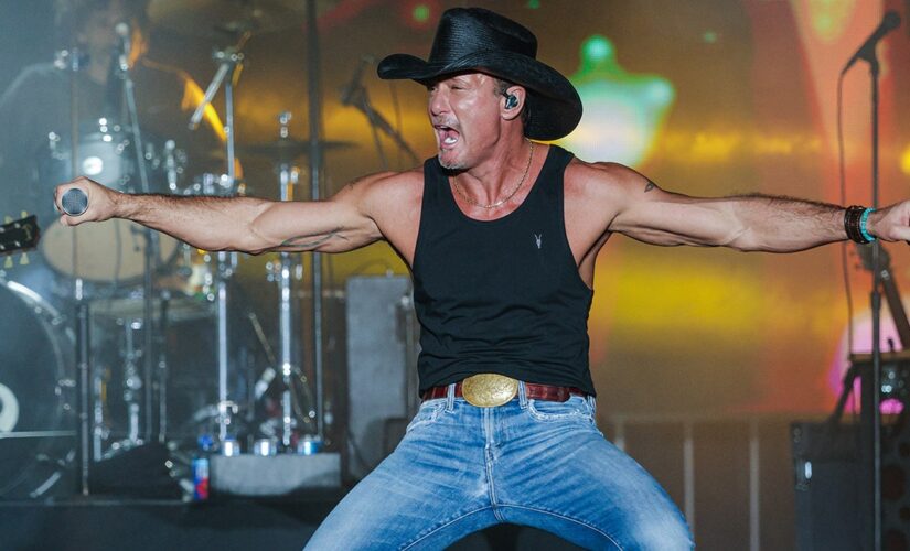 Country star Tim McGraw takes a tumble at his concert and falls into fans