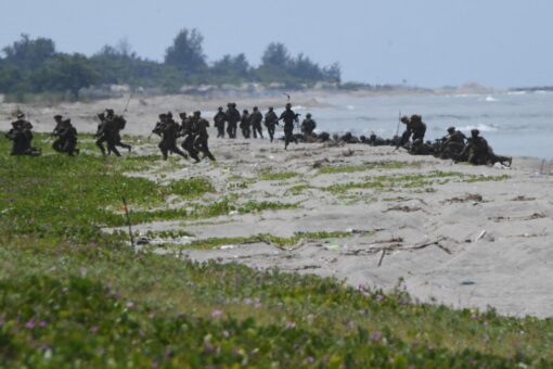 US Marines storm beach near disputed reef in South China Sea joint military drills