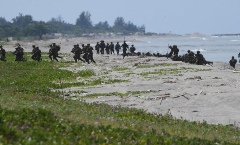 US Marines storm beach near disputed reef in South China Sea joint military drills