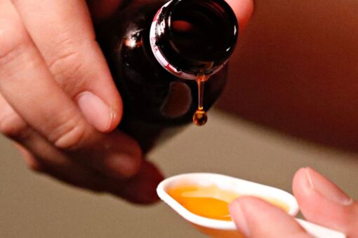 Indonesia revokes licenses of two pharma firms after syrup-like drug linked to child deaths