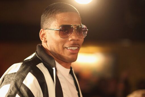 Nelly surprises fan with Lesch-Nyhan syndrome by giving him jacket off his back