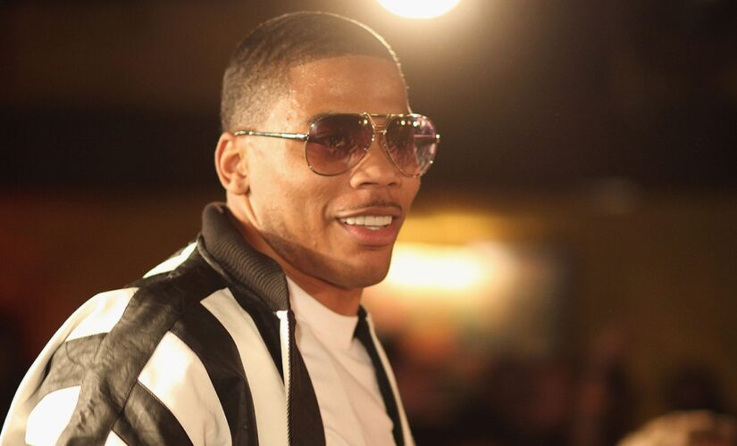 Nelly surprises fan with Lesch-Nyhan syndrome by giving him jacket off his back