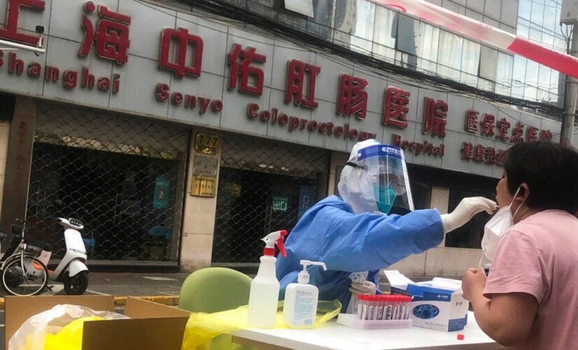 Recent spike in China’s COVID-19 cases sees Shanghai promote new booster doses through a straw