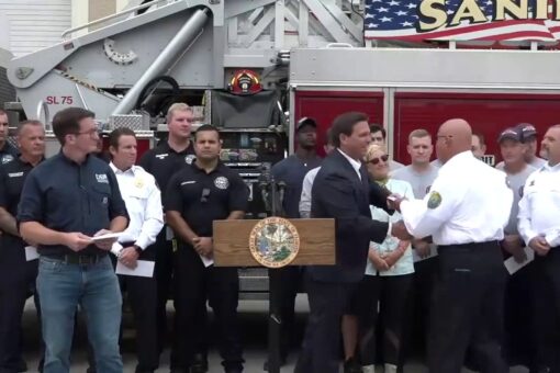 Florida Gov. Ron DeSantis hand delivers $1,000 bonus to first responders working Hurricane Ian response