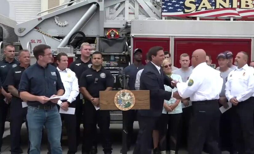 Florida Gov. Ron DeSantis hand delivers $1,000 bonus to first responders working Hurricane Ian response