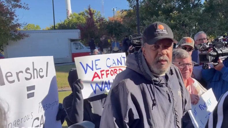 Protester allegedly attacks Herschel Walker with racial slur, crashes press conference on Warnock evictions