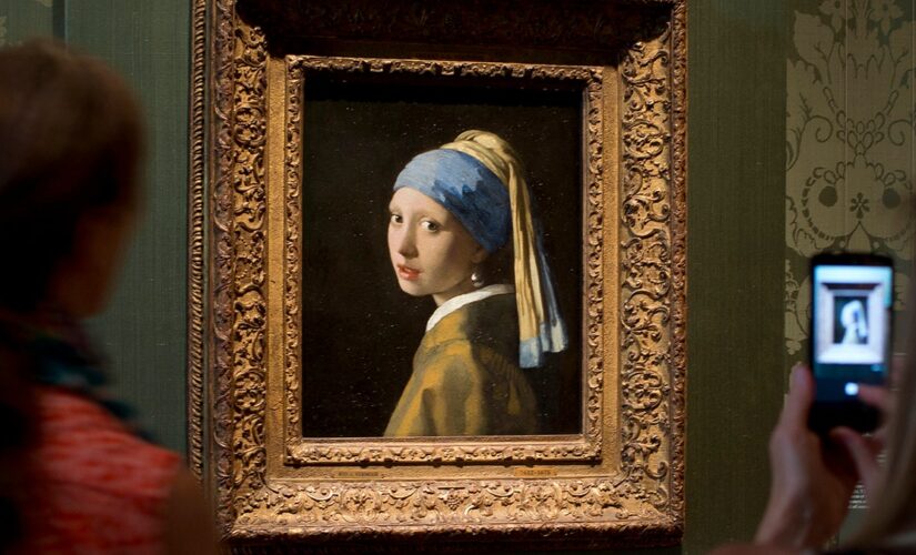 Anti-oil activists target ‘Girl with a Pearl Earring’ painting with glue, red liquid