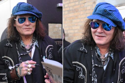 Johnny Depp signs autographs before Jeff Beck concert in New York ahead of Amber Heard appeal