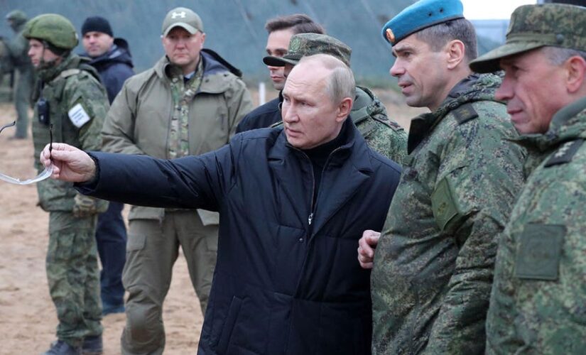 Vladimir Putin in new video sparks cancer rumors over intravenous marks on hand