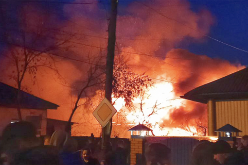 Russian fighter jet crashes into residential building in Siberian city