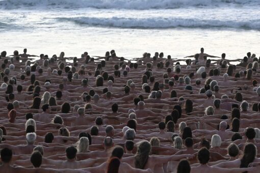 Hundreds pose nude on Australian beach to raise awareness for skin cancer