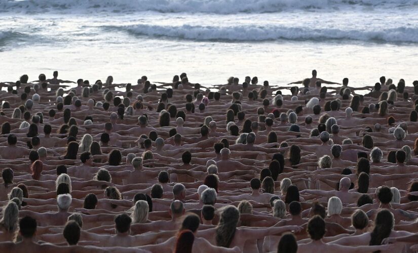 Hundreds pose nude on Australian beach to raise awareness for skin cancer