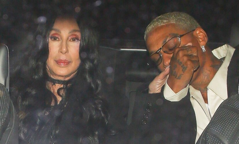 Cher gets a kiss during date night with new boyfriend, Alexander Edwards, who is 40 years her junior