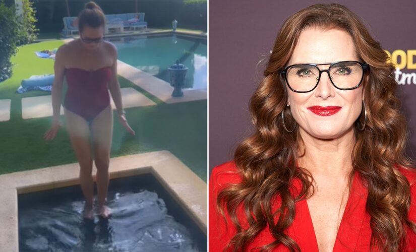 Brooke Shields shows off her toned body in red swimsuit for icy Thanksgiving plunge