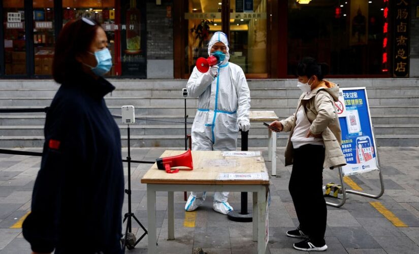 China sees spike in COVID-19 cases