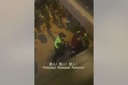 Video shows Chinese officers arresting BBC reporter as China defends detention