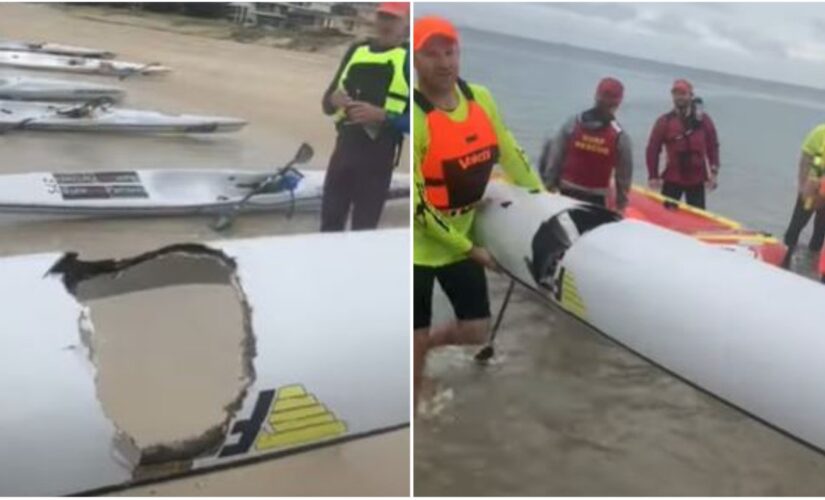 Australian teenager sent flying into the air after great white takes massive bite out of his surf ski
