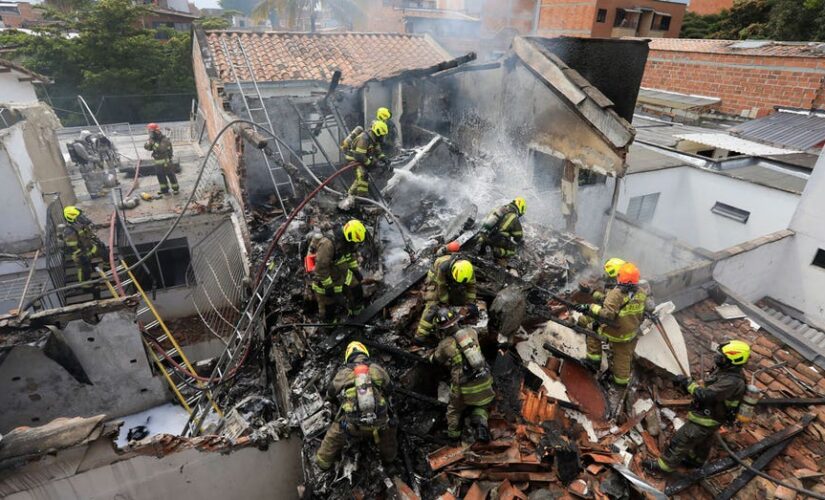 Small plane crashes in Colombian neighborhood killing 8