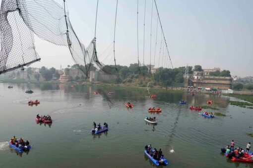 India prime minister visits site of bridge collapse as families mourn