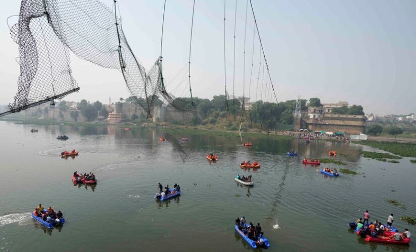 India prime minister visits site of bridge collapse as families mourn