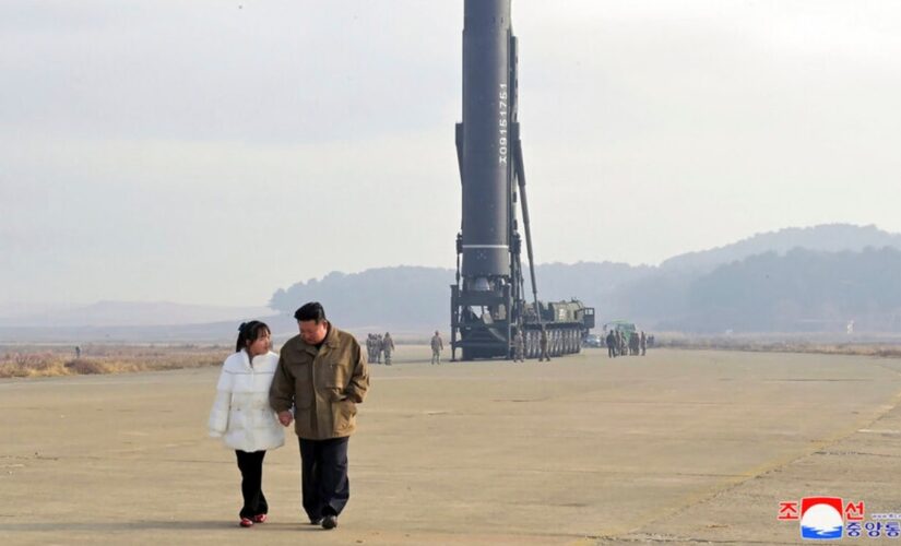 North Korea unveils daughter of Kim Jong Un at missile launch site